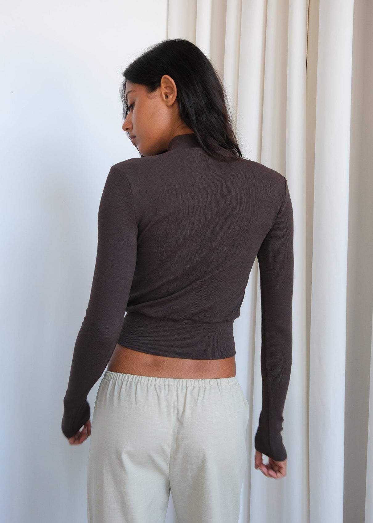 Marlo top by geel.us featuring a stylish, casual women’s apparel with a fitted design and soft fabric in a neutral color.